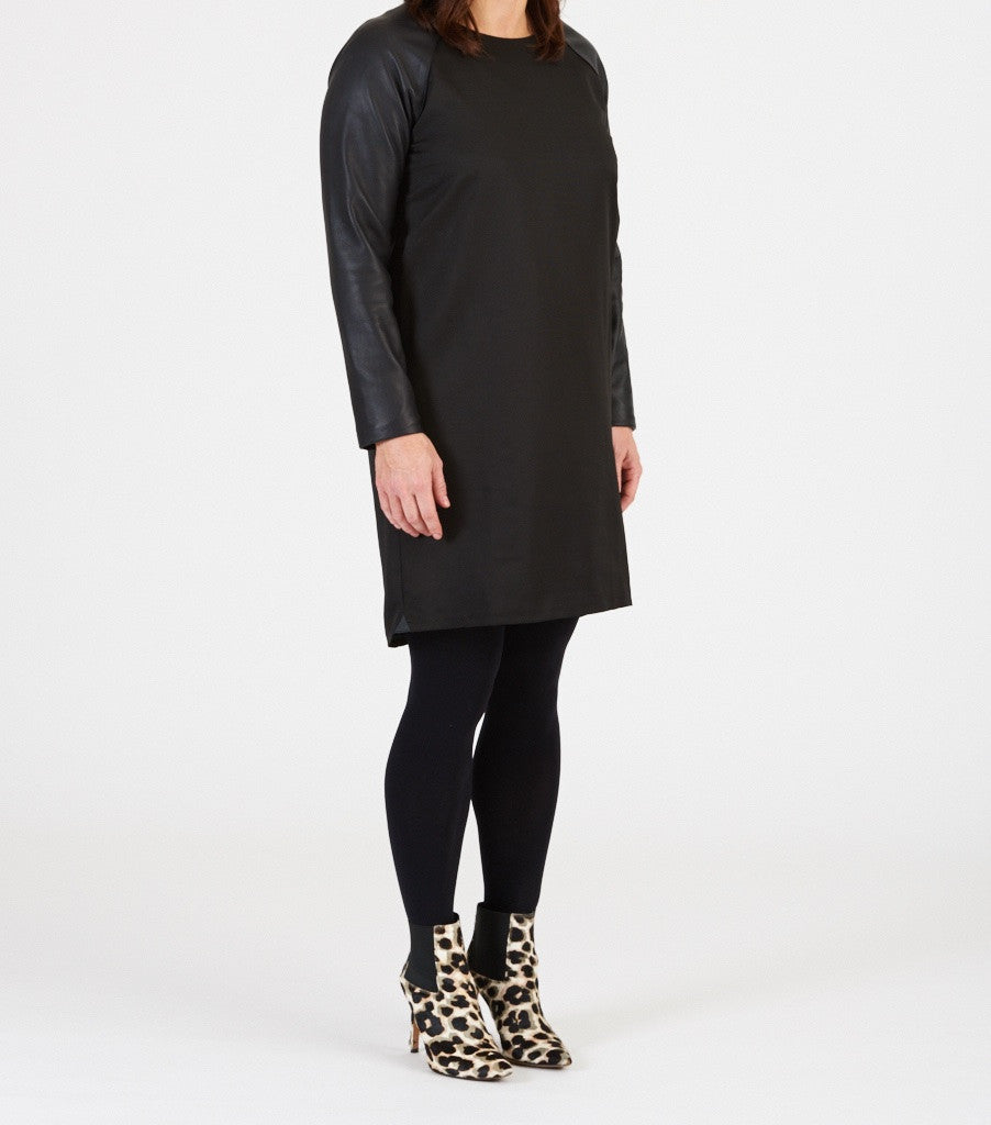 Leather sleeve shift dress with cashmere blend fabric. Available in pink and black. 100% authentic leather